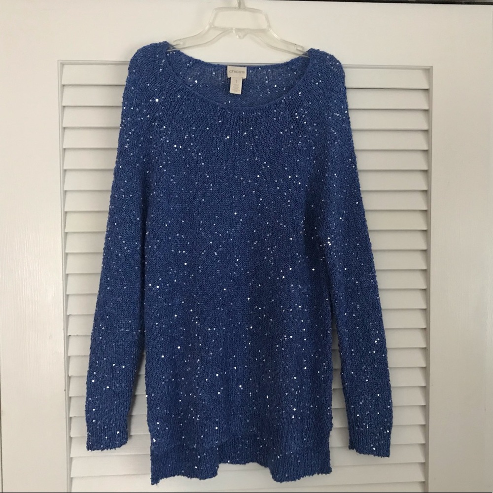 Vivid blue sweater with silver sequins.